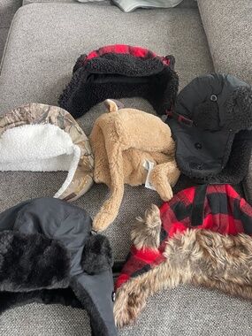 Lots of kids trapper hats